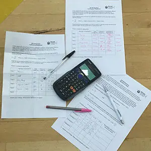 Paperwork of calculating the location of a person’s centre of mass exercise. 