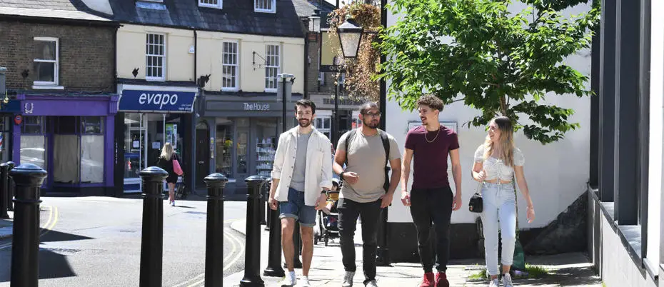 Students walking up the high street in Uxbridge