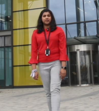 Amrutha walking towards camera