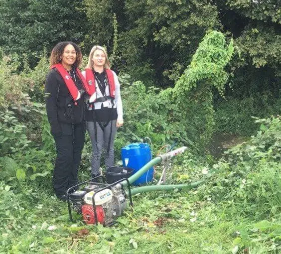 Environmental Sciences student on placement setting up the chemical aeration pump