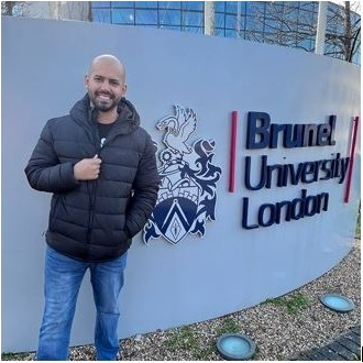 Turki standing in front of Brunel University