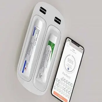 DermaTrack smart app on mobile phone with skin condition creams image