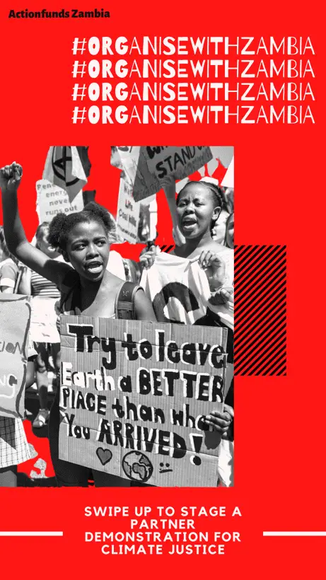 Children holding posters demonstrating for climate justice