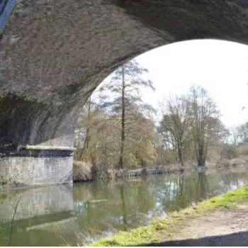 Canal and footpath underneath bridge Image