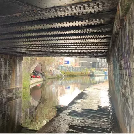 Underneath the Regent's Canal bridge and a view of the canal