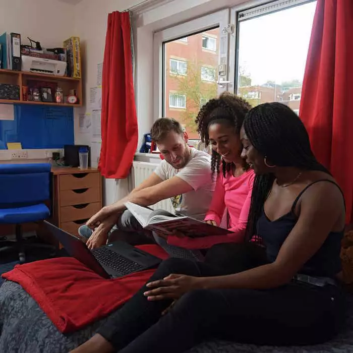 3 students studying in student accommodation at Brunel University London
