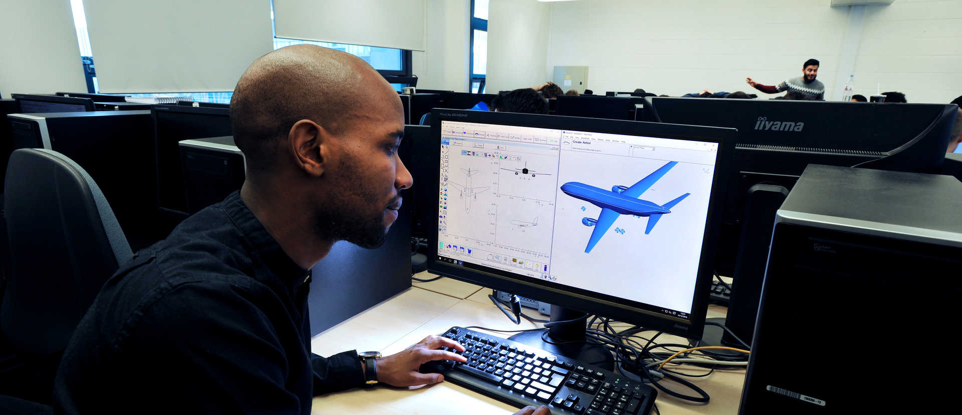 UG Aerospace_Engineering_MStudent looking at flight design-4709