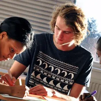 image of three students working