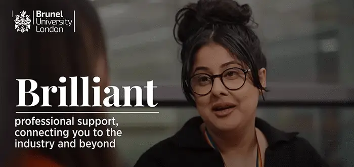 woman with glasses with a Brilliant sign in the front