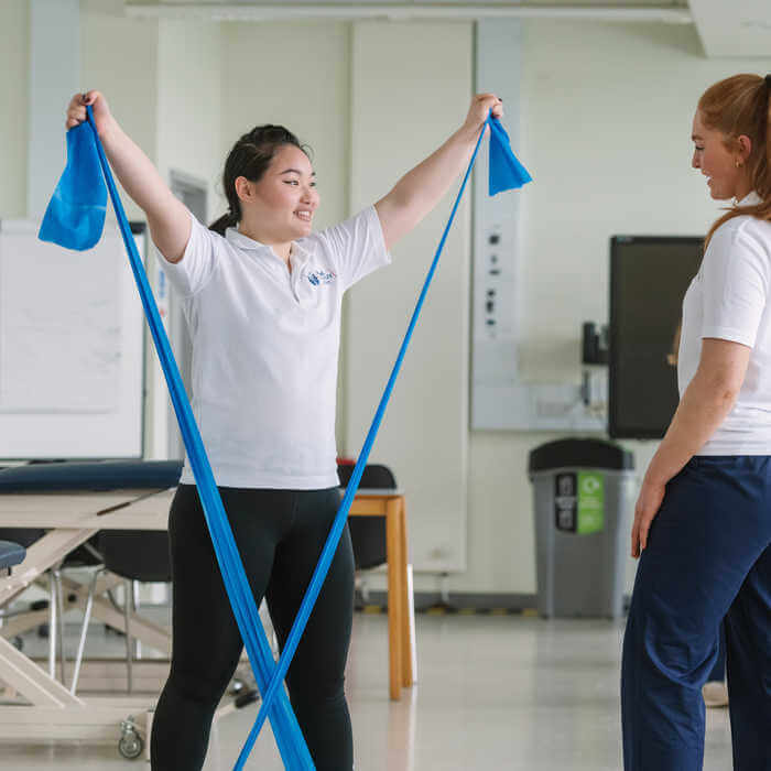 Physio students doing some exercises