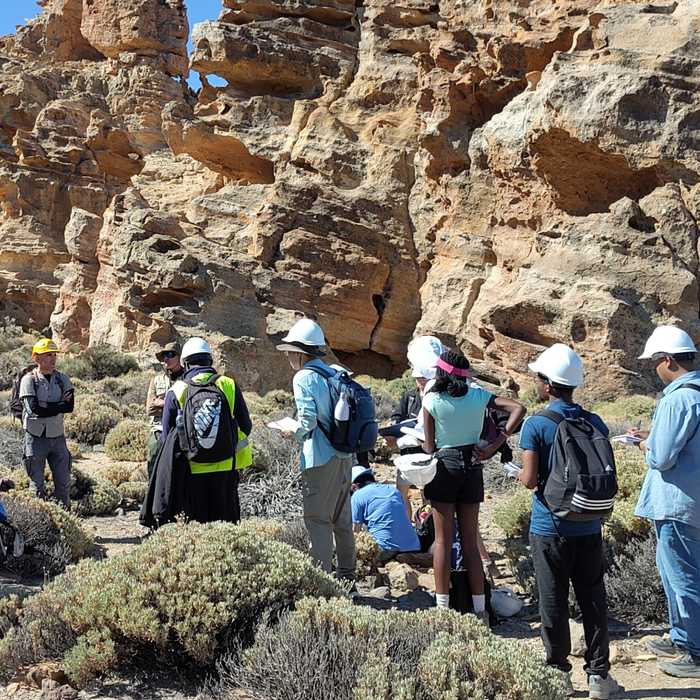 Geography students exploring the rocks