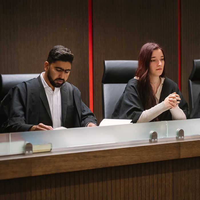 Law students judging in a court room