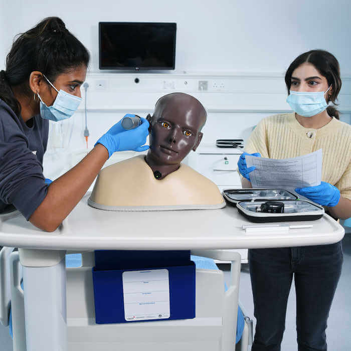 Physician Associate students doing practical session