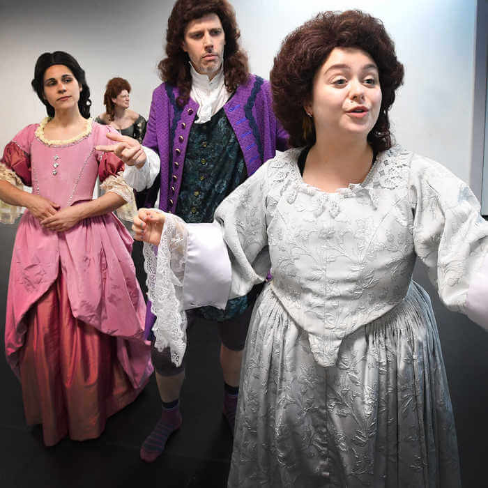 Theatre students performing on the stage of Brunel University London