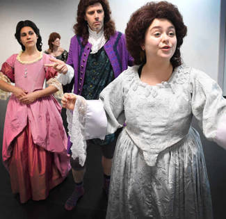 Theatre students performing on the stage of Brunel University London