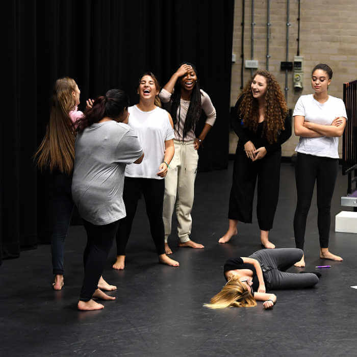 Theatre students practicing on the stage of Brunel University London